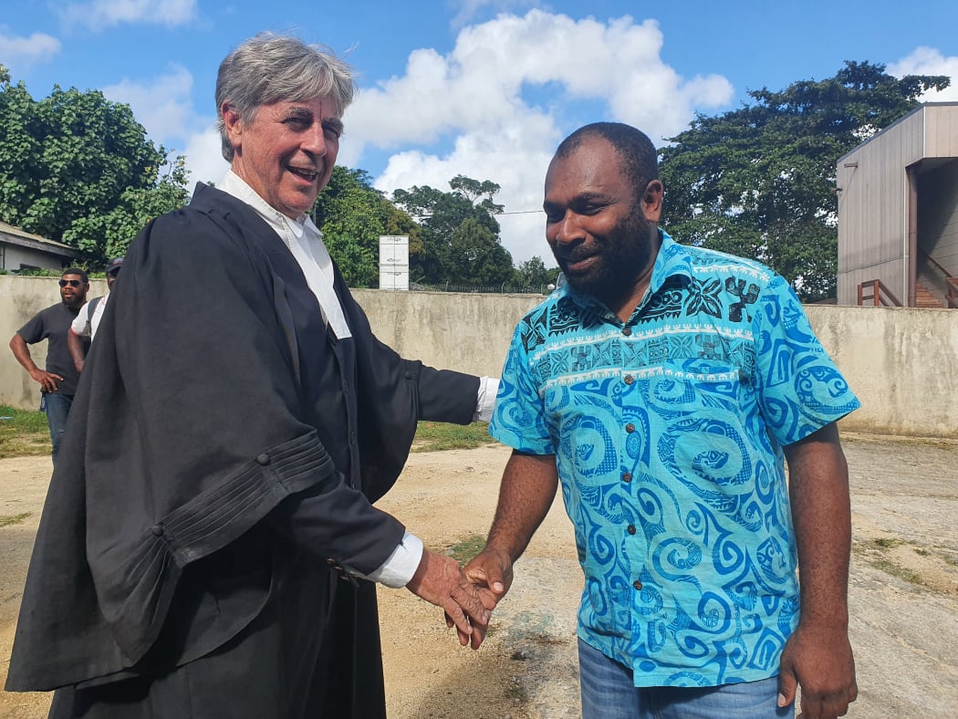 Lawyer Nigel Morisson and his client, Vanuatu's former Public Service Commission chairman Martin Mahe, after charges against the latter were dismissed by the country's Supreme Court.