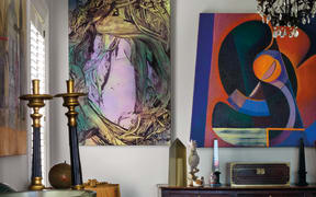 Parnell cottage, Auckland. The two paintings above the nineteenth-century English oak dresser base in the dining room of this Parnell cottage are by Judy Millar (left) and Imogen Taylor.