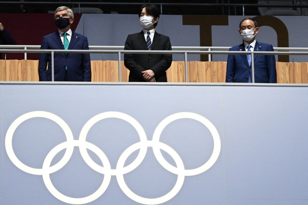 Japan's Prime Minister Yoshihide Suga , Japan's Emperor Naruhito, President of the International Olympic Committee (IOC) Thomas Bach during the closing ceremony of the Tokyo 2020 Olympic Games, at the Olympic Stadium, in Tokyo