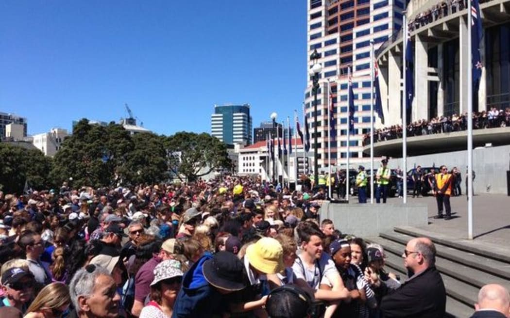 Crowds gather to welcome the All Blacks in Wellington.