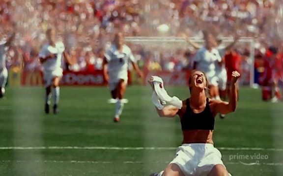 USA player Brandi Chastain celebrating the winning penalty in the 1999 Fifa Women’s World Cup. (Episode 3: Belief)