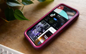 TikTok signed a deal to sell its US assets to a group of American investors, its CEO said in a memo. Brook Joyner/CNN