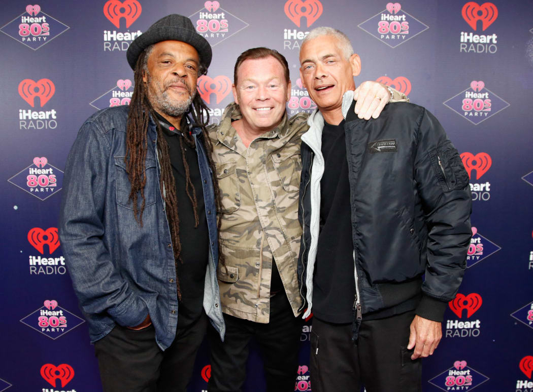Musicians Astro, Ali Campbell and Michael Virtue of UB40 arrive at the iHeart80s Party 2017 at SAP Center on January 28, 2017 in San Jose, California.