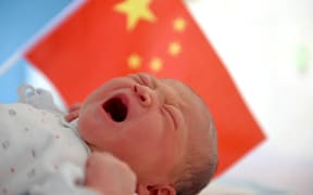 A Chinese newborn baby is seen at a hospital in Huainan city, east China's Anhui province, 1 October 2018.