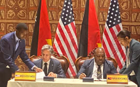 US Secretary of State Antony Blinken and PNG Defence Minister, Win Barki Daki, sign a new bilateral defense cooperation agreement.