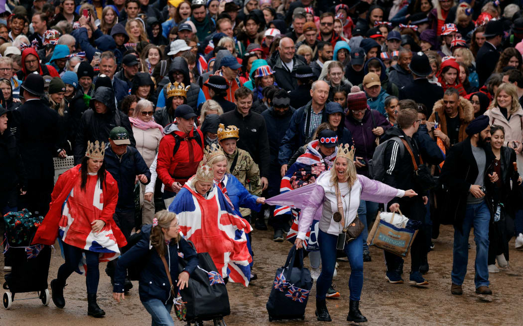 ritain's King Charles III and Britain's Camilla, Queen Consort travel in the Diamond State Coach, in the 'King's Procession', a journey of two kilometres from Buckingham Palace to Westminster Abbey in central London on May 6, 2023, ahead of their coronations. - The set-piece coronation is the first in Britain in 70 years, and only the second in history to be televised. Charles will be the 40th reigning monarch to be crowned at the central London church since King William I in 1066. Outside the UK, he is also king of 14 other Commonwealth countries, including Australia, Canada and New Zealand. Camilla, his second wife, will be crowned queen alongside him, and be known as Queen Camilla after the ceremony. (Photo by PIROSCHKA VAN DE WOUW / POOL / AFP)
