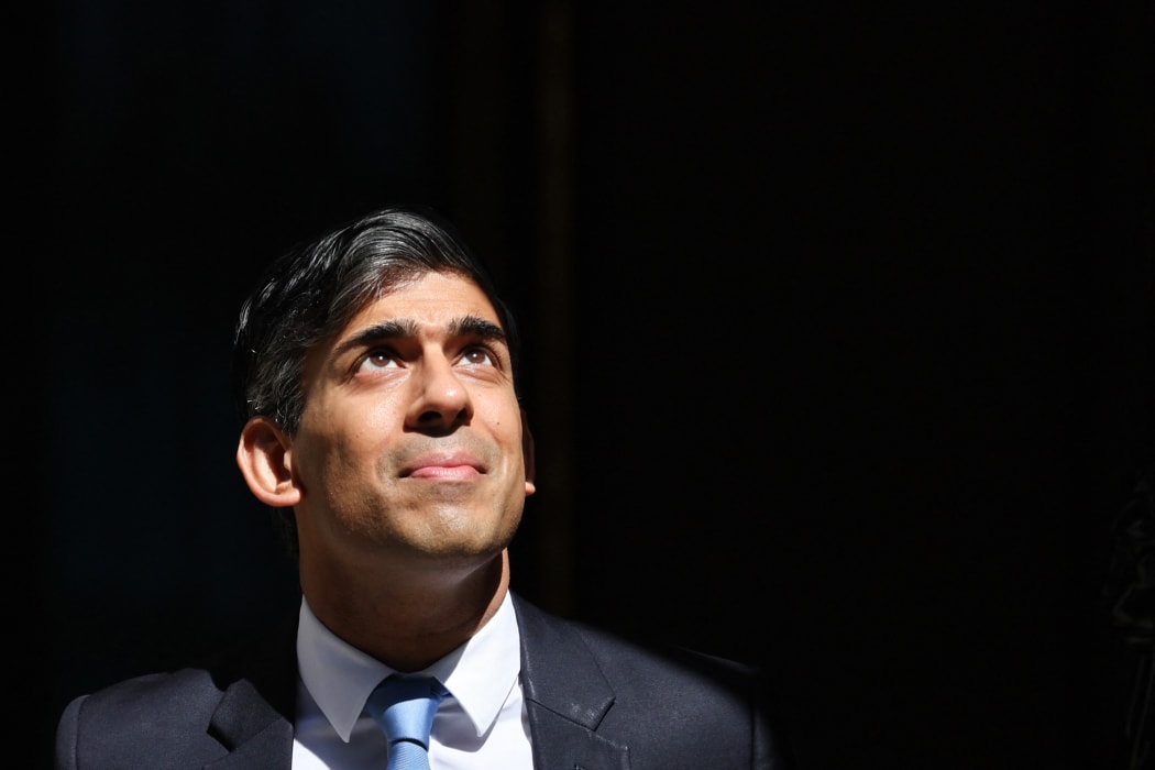 Britain's Prime Minister Rishi Sunak reacts as he leaves 10 Downing Street in central London on May 8, 2024 to take part in the weekly session of Prime Minister's Questions (PMQs) in the House of Commons. (Photo by Adrian DENNIS / AFP)