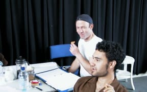 Simon Prast shares a laugh during a rehearsal with Taika Waititi