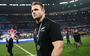 Captain Sam Cane walks on the field with his silver medal after South Africa won the 2023 Rugby World Cup Final match between New Zealand and the Springboks at the Stade de France.