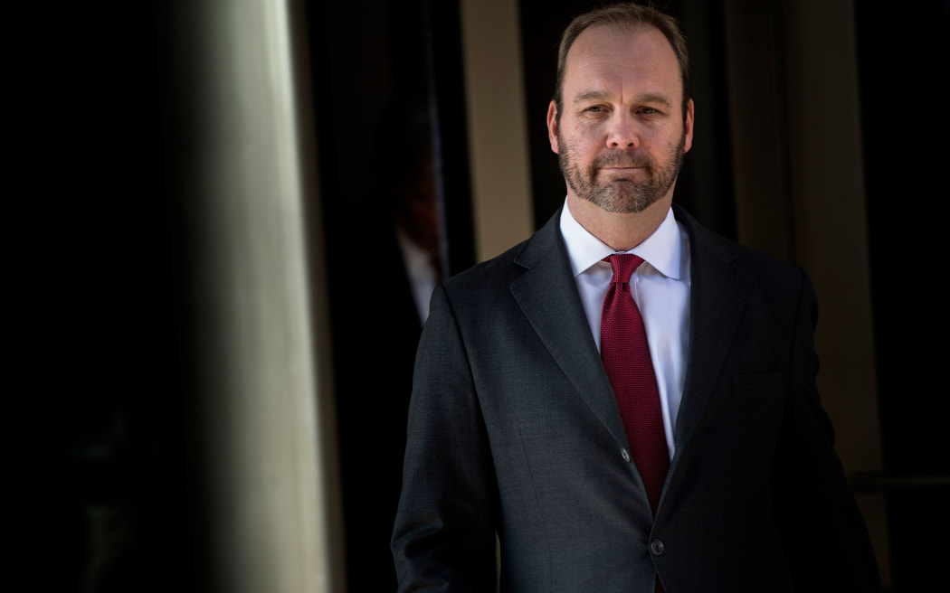In this file photo taken on December 11, 2017 former Trump campaign official Rick Gates leaves Federal Court in Washington, DC.