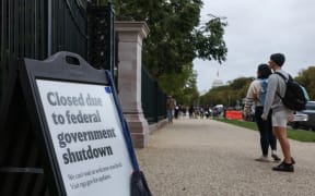 WASHINGTON, DC - OCTOBER 12: Closed signage is seen around the National Gallery of Art Sculpture Garden on the National Mall on October 12, 2025 in Washington, DC. Additional Smithsonian locations closed on Sunday due to a lapse in funding from the government shutdown.   Anna Moneymaker/Getty Images/AFP (Photo by Anna Moneymaker / GETTY IMAGES NORTH AMERICA / Getty Images via AFP)