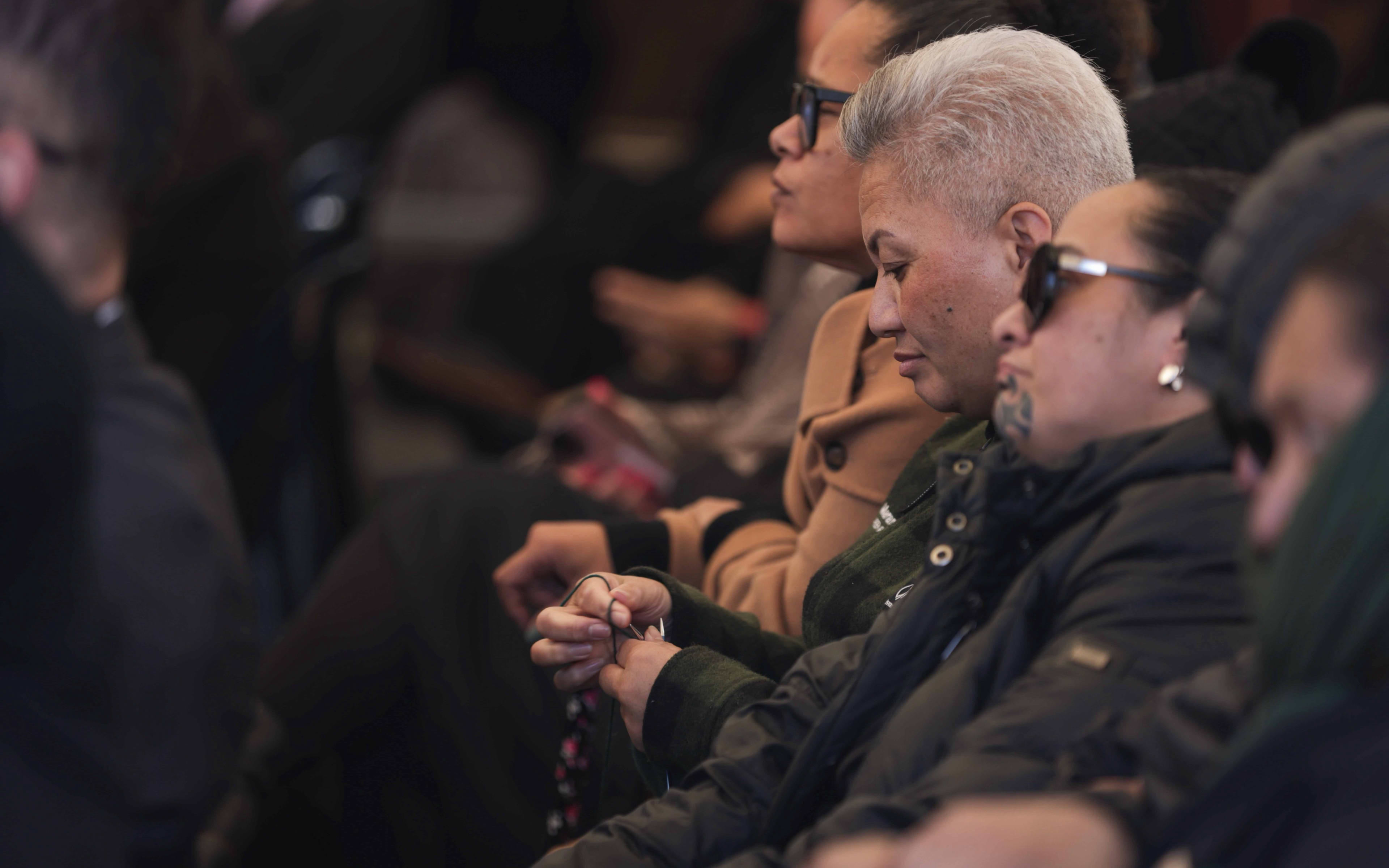 Marama Davidson at the tangi for Adrian Ruwhare.
