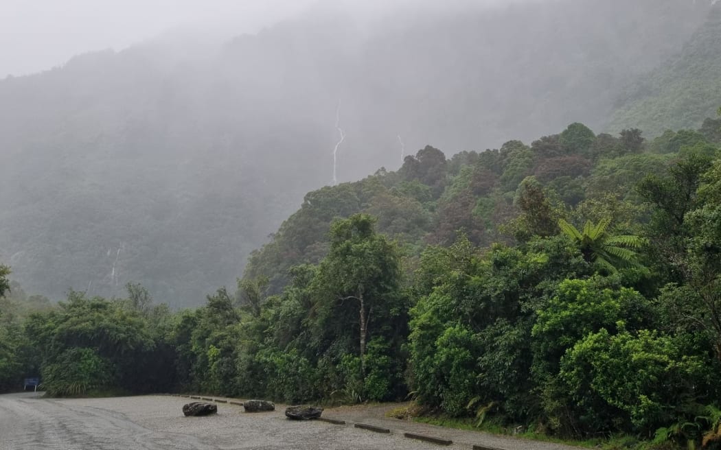 Mist and clouds hover over the area on the road to Franz Josef glacier as the region prepares for heavy rain on 19 January, 2024.