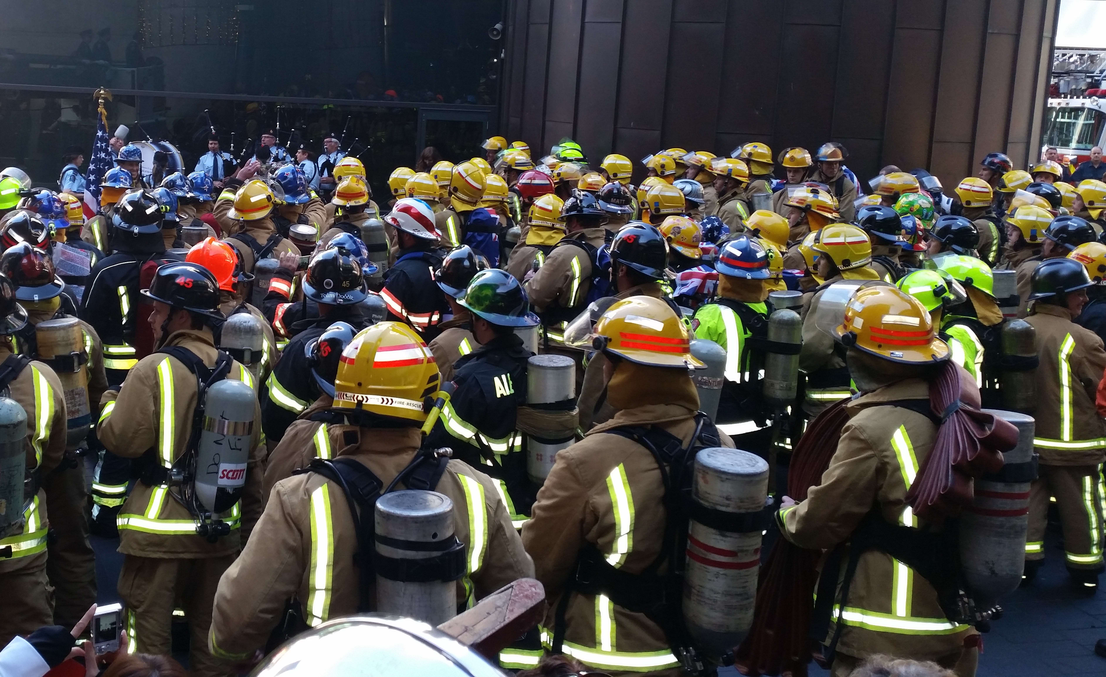 About 160 firefighters gathered to climb Auckland's Sky Tower in commemoration of the firefighters who died during 9/11.