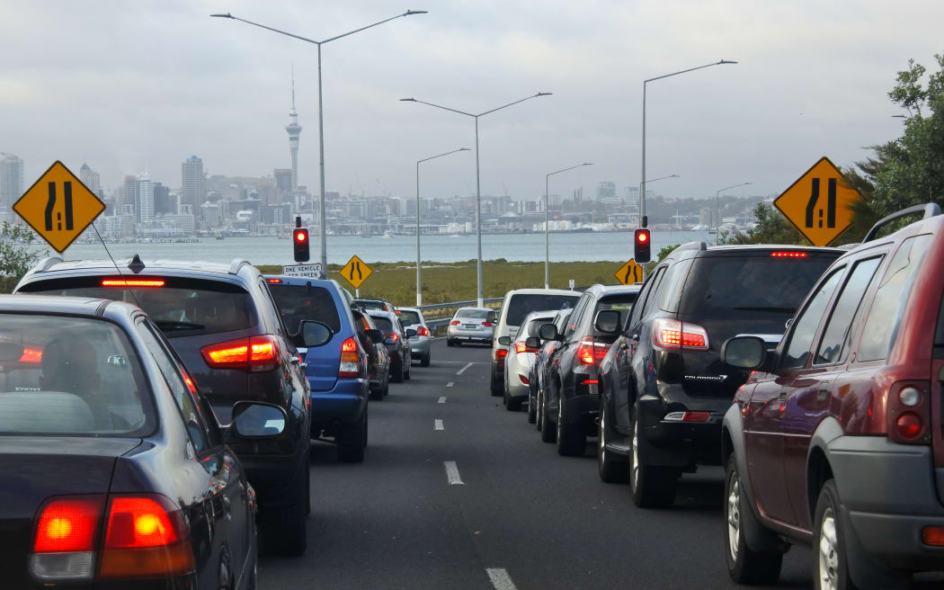 AUCKLAND - FEB 13 2017: Traffic jam in Auckland, New Zealand.Auckland has the longest morning peak-time in Australasia, from 5am - 10am.