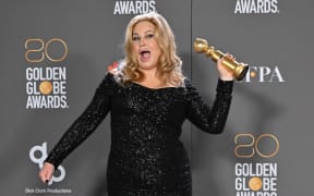 US actress Jennifer Coolidge poses with the award for Best Supporting Actress - Television Limited Series/Motion Picture for "The White Lotus" in the press room during the 80th annual Golden Globe Awards at The Beverly Hilton hotel in Beverly Hills, California, on January 10, 2023. (Photo by Frederic J. Brown / AFP)