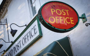 A general view of the exterior of the Village Shop and Post Office in South Warnborough near Odiham, on January 10, 2024. Jo Hamilton, The former postmistress of the village shop was wrongly convicted of theft due to the Post Office Horizon scandal. Her conviction was quashed in 2021 when she was found to be a victim of a faulty accounting system. 
Between 1999 and 2015, some 700 Post Office branch managers were prosecuted, sometimes to the point of having their lives shattered, based on information from accounting software called Horizon, installed by Japanese tech giant Fujitsu at the end of the 1990s. A public inquiry into the scandal opened in February 2022 but has yet to examine who at the top of the Post Office knew what and when. On January 10, 2024, the former boss of the Post Office Paula Vennells said she would return a royal honour received from Queen Elizabeth II, as public anger mounts.