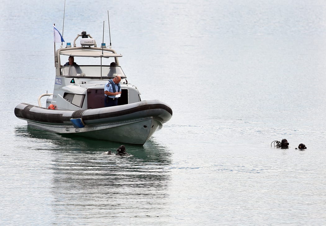 Divers searched Shelly Bay on Tuesday.