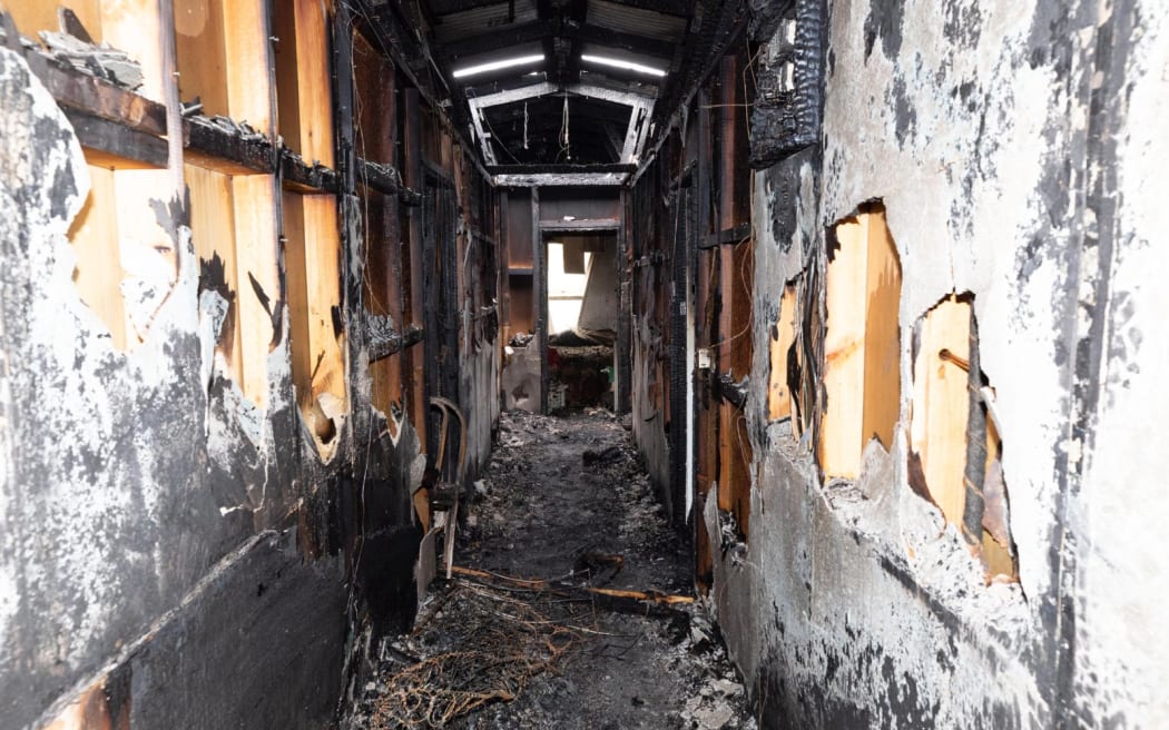 A burned-out corridor in  Berkenhoff Lodge, Taupō, where fire investigators found multiple safety breaches.