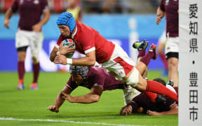 Justin Tipuric of Wales breaks through to score a try.