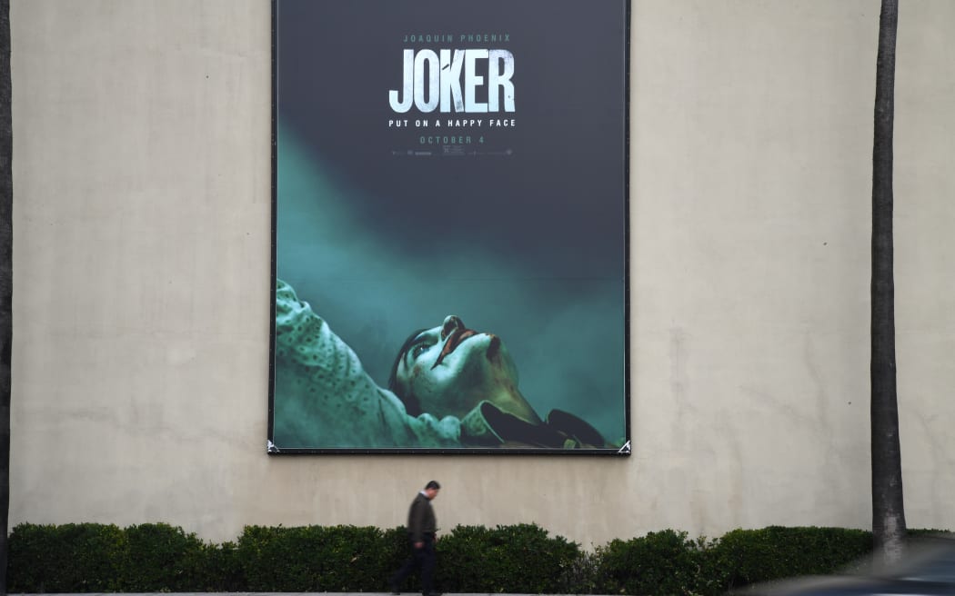 A poster for the upcoming film "The Joker" is seen outside Warner Brothers Studios in Burbank, California, September 27, 2019.