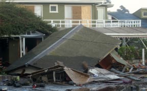 A collapsed structure in Concon, 110 km northwest of the capital Santiago, hit by an 8.3-magnitude earthquake.