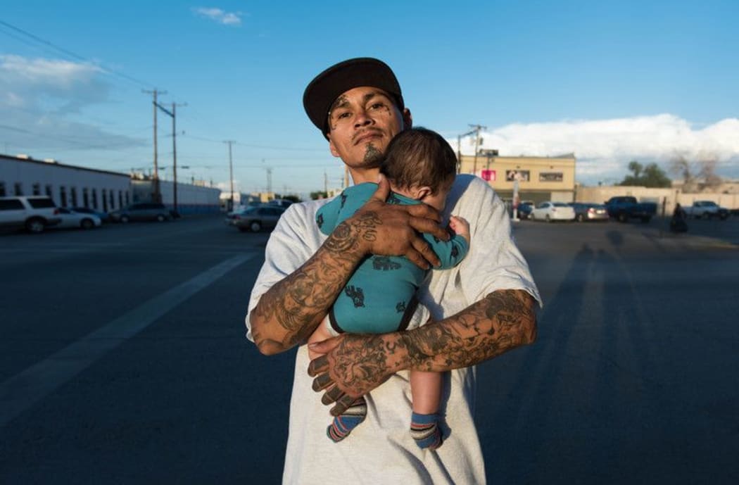Cesar and son, El Paso, Texas, August 2015.