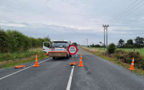 Cordon at intersection of Eltham and Hastings Road - kilometres down the road from the crash site.