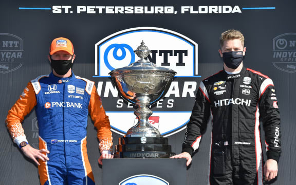 Championship Contenders #9 Scott Dixon, Chip Ganassi Racing Honda, and #1 Josef Newgarden, Team Penske Chevrolet pose with the trophy ahead of the 2020 season decider at St. Petersburg in Florida.