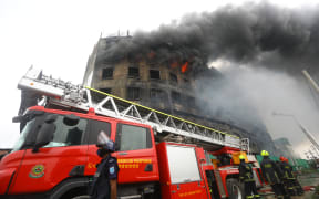 The fire broke at the factory of Hashem Foods in Narayanganj's Rupganj outskirts of Dhaka on 10 July 2021 killed at least 52 people.