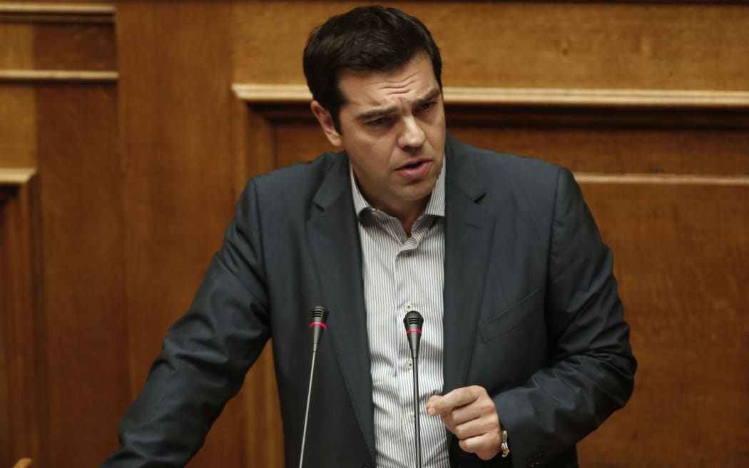 Greece's Prime Minister Alexis Tsipras delivers a speech during a parliament meeting in Athens.