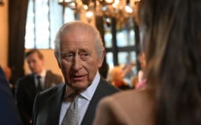 Britain's King Charles III meets guests during a visit to the 700-year-old medieval manor Samlesbury Hall in Preston, north-west England on February 9, 2026.