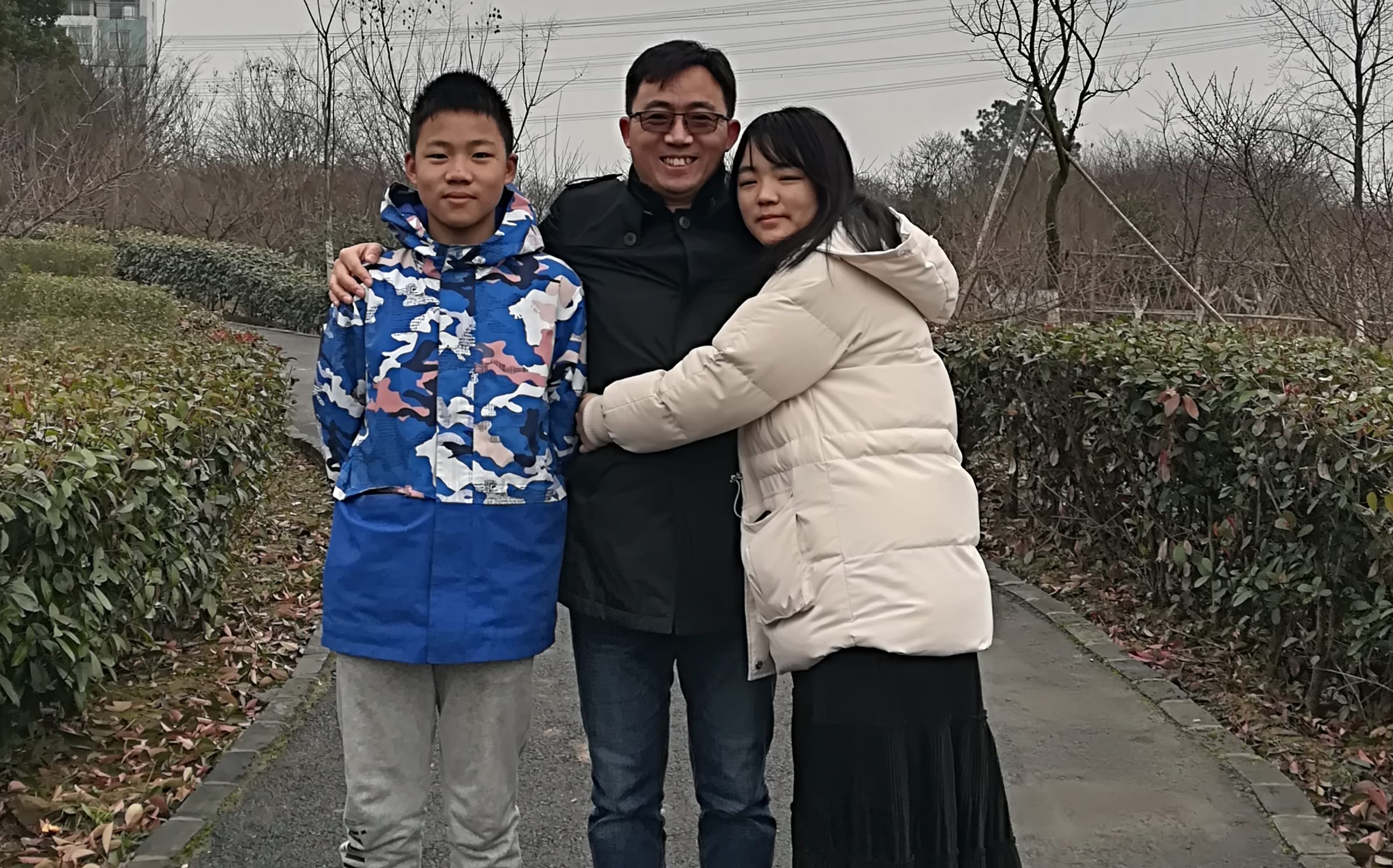Stephen Wang with his two children, Joshua and Shannon, in Shanghai.