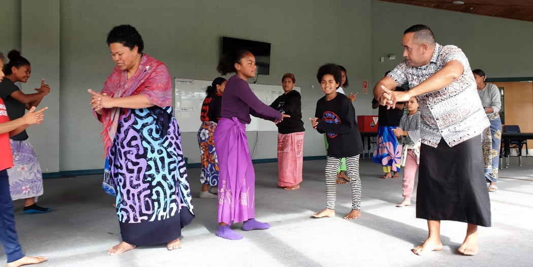 Young Fijians learn the traditional meke seasea dance in Auckland.