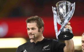 All Blacks' Richie McCaw with the trophy for winning the match. All Blacks vs Wales. 2014.