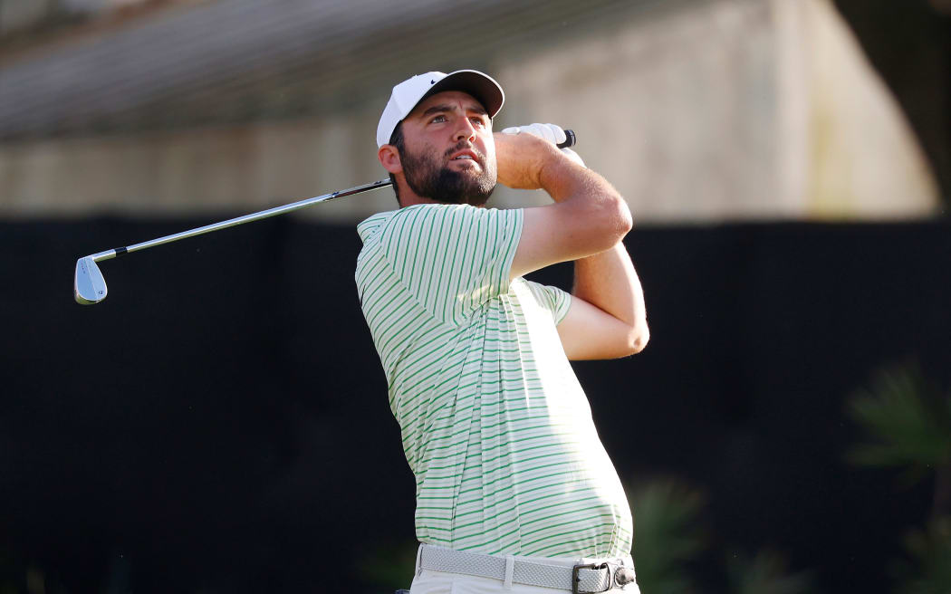 ORLANDO, FL - MARCH 09: PGA golfer Scottie Scheffler hits his tee shot on the 17th hole during the Arnold Palmer Invitational presented by MasterCard at the Arnold Palmer's Bay Hill Club & Lodge on March 9, 2024, in Orlando, Florida. (Photo by Brian Spurlock/Icon Sportswire)