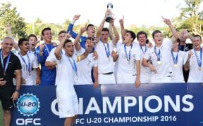 New Zealand celebrate with the trophy.