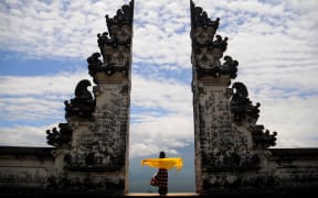 Pura Madya Lempuyang, Karangasem, Bali, with Mount Agung in the background.