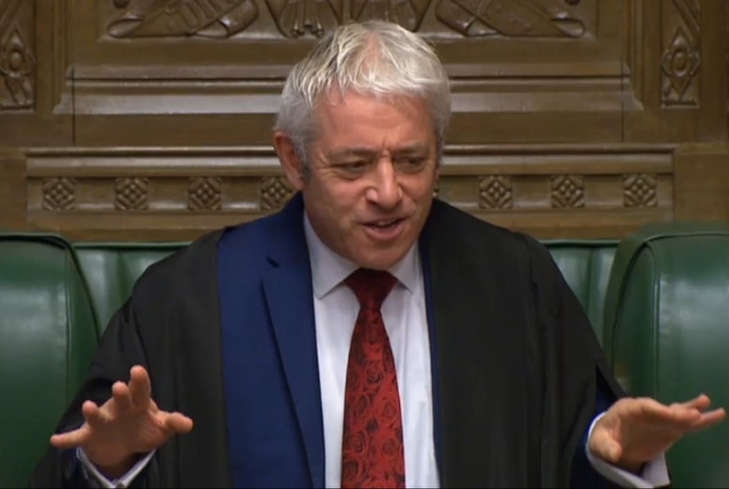 A video grab from footage broadcast by the UK Parliament's Parliamentary Recording Unit (PRU) shows Britain's Speaker of the House of Commons John Bercow officiates as Prime Minister Boris Johnson makes a statement in the House of Commons in London on October 19, 2019.