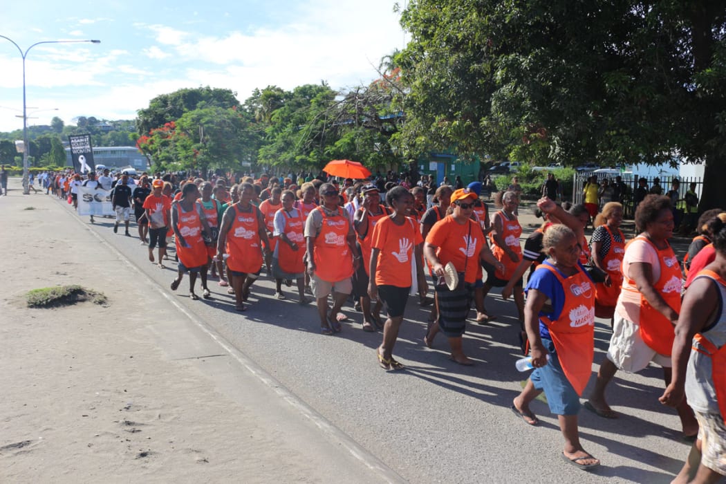 Solomon Islanders mark White Ribbon Day in Honiara on Friday 25th November, 2016. This year was the first time local businesses joined the march in support of ending violence against women.