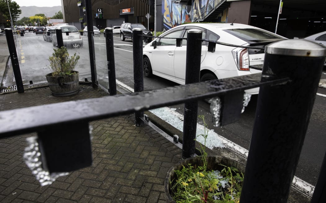 Glass barriers smashed by a severe thunderstorm, outside Commonsense Organics, in Lower Hutt on 12 December, 2023.