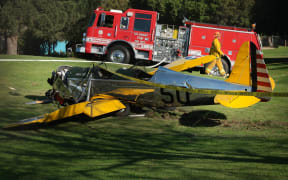 The small plane owned by US actor Harrison Ford is seen after crashing at the Penmar Golf Course in Venice, California.
