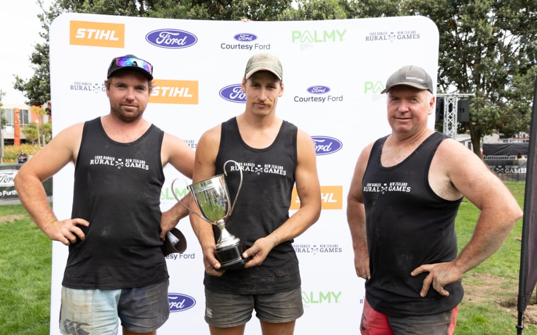 National speed fencing champion Tim Garrick (centre) shares the podium with father and son duo Tony Bouskill, 3rd (left) and Shane Bouskill, 2nd (right) at the Rural Games in Palmerston North, March 2024. 

Tony Bouskill 3rd, champion Tim Garrick 1st and Shane Bouskill 2nd at the New Zealand Speed Fencing Championship at the Rural Games in Palmerston North in March 2024.