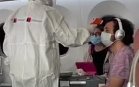 Rapa Nui bound passengers being tested for Covid-19 symptoms.