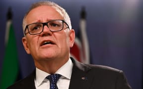 Australia's former prime minister Scott Morrison speaks to media during a press conference in Sydney on August 17, 2022. - Australia's Prime Minister Anthony Albanese on August 16 said that his predecessor Scott Morrison secretly seized control of five ministerial posts, labelling it an "unprecedented trashing of our democracy". (Photo by Steven Saphore / AFP)