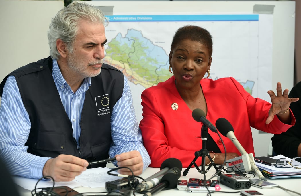 EU commissioner Christos Stylianides (L) watches as UN's Valerie Amos addresses the media at the UN's headquarters in Kathmandu on 1 May.