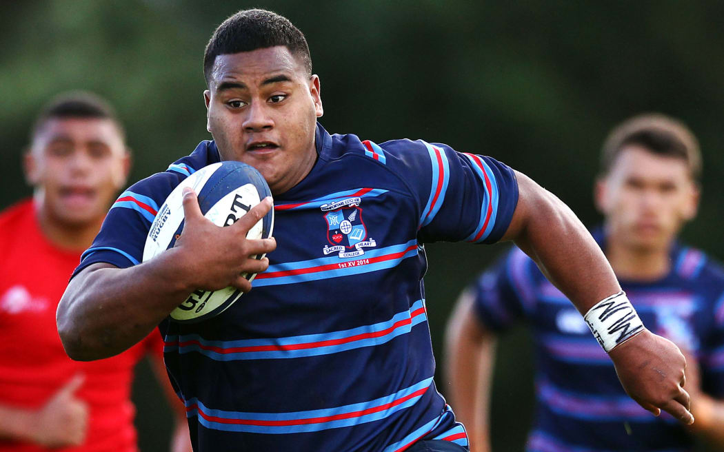 Daniel ( Taniela ) Tupou of Sacred Heart makes a break. Auckland Secondary Schools 1st XV rugby union match, Sacred Heart v Kelston Boys at Sacred Heart College, Auckland, New Zealand. Saturday 10th May 2014.