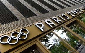 This photograph shows the entrance of the headquarters of the Paris 2024 Olympics (Cojo) headquarters as Police raided just over a year out from the opening ceremony of the quadrennial sporting showpiece, in Saint-Denis, northern Paris, on June 20, 2023. (Photo by JULIEN DE ROSA / AFP)