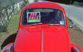 for sale sign on car