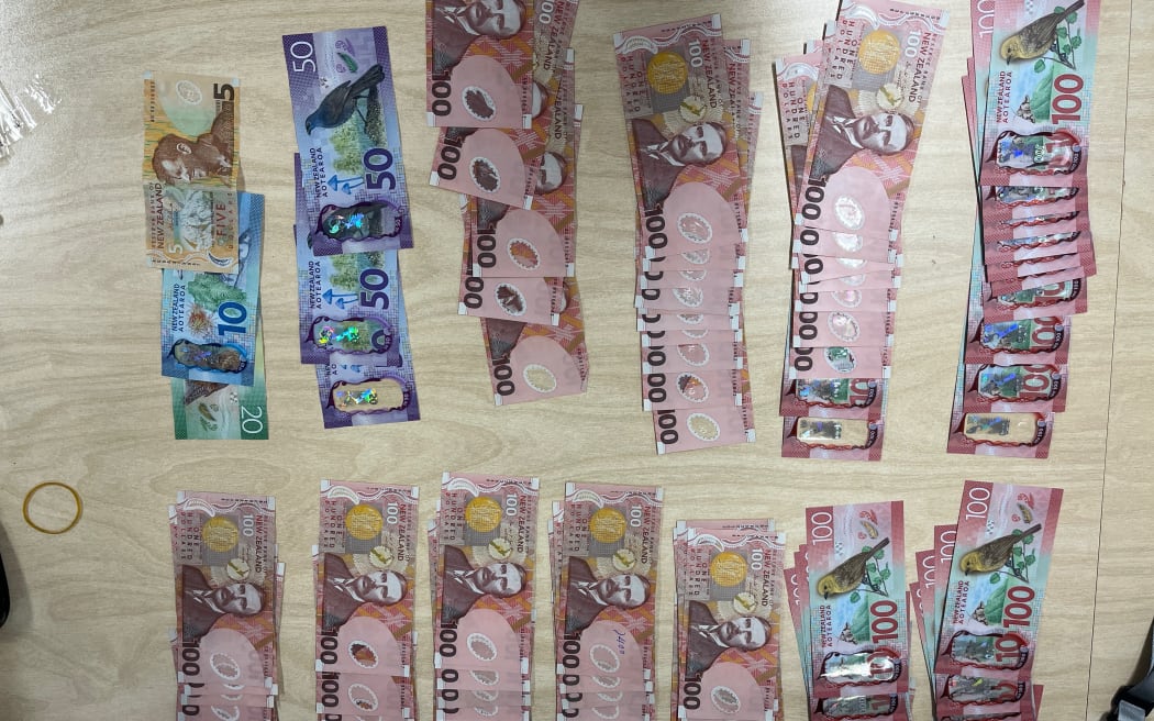 Money seized from police in relation to an alleged blessing scam.